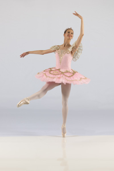 Metrowest Dance Academy student in beautiful and elegant pink and gold dress.